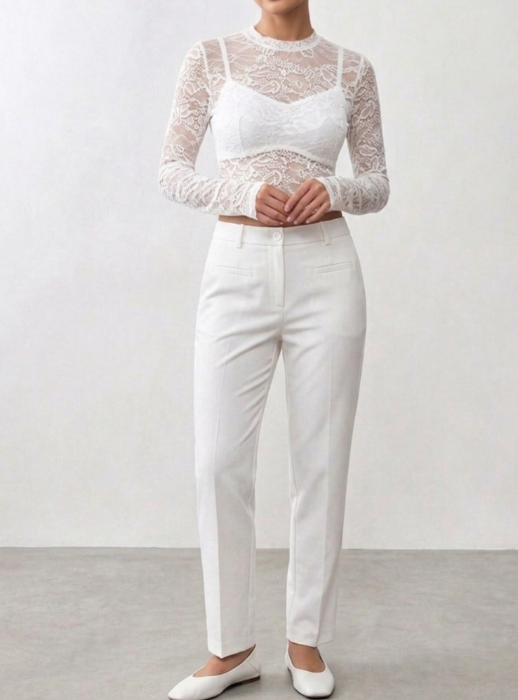 BLUSA DE RENDA MANGA LONGA COM ZIPER NAS COSTAS.